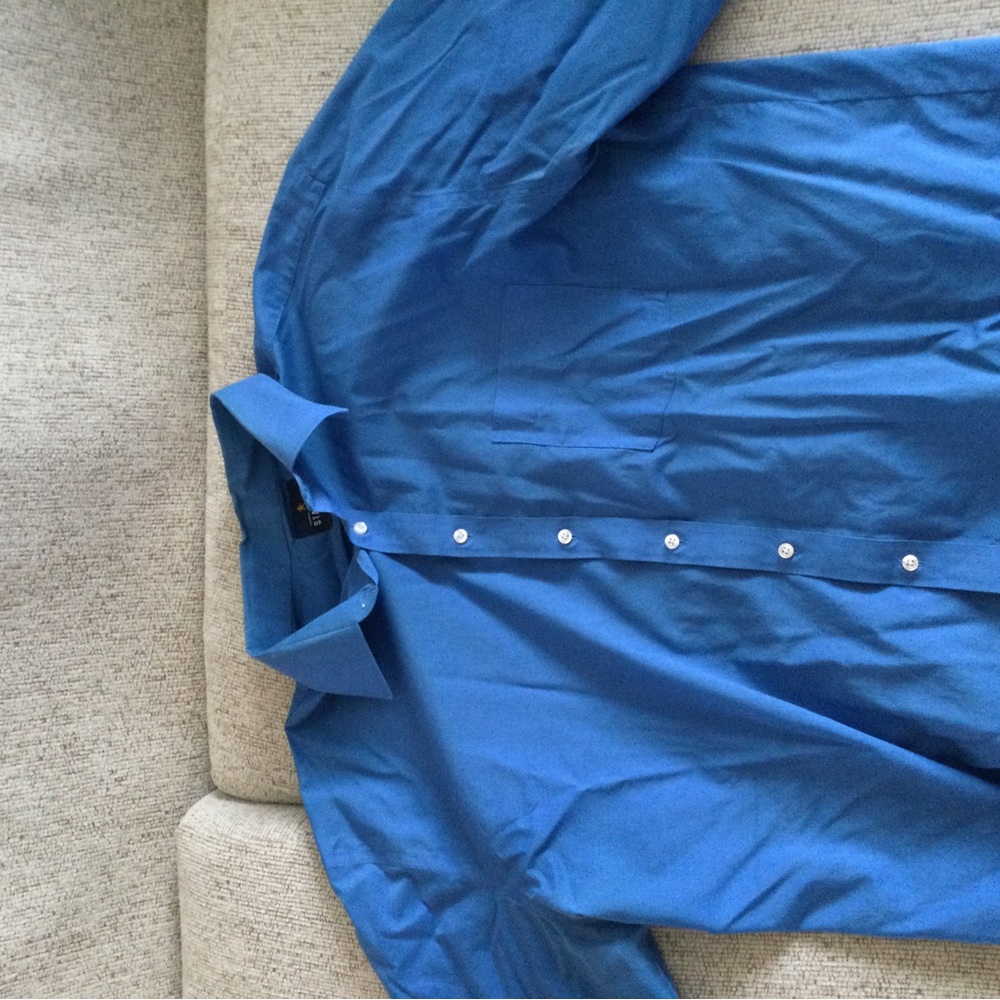 Bright blue button down shirt.